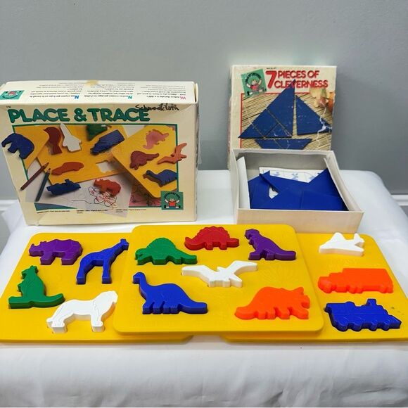 Discovery Toys 7 pieces of cleverness and place and trace stencil puzzles - Picture 1 of 1